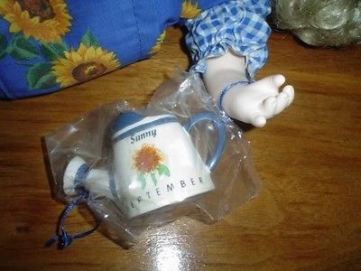 Precious moments garden of friends doll sales